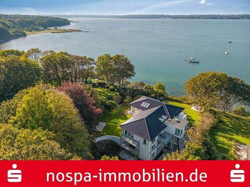 Luftbildaufnahme - Luxuswohnung im 1.OG mit spektakulärem Blick über die Flensburger Förde und eigenem Strandzugang!