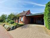 Carport mit überdachtem Seiteneingang - 3 Zimmer Einfamilienhaus zum Kaufen in Viöl