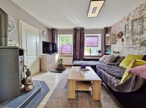Wohnzimmer mit Ofen - 