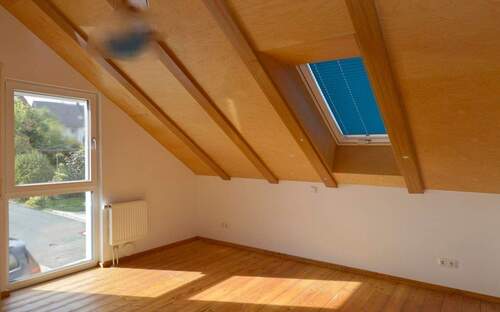 Schlaf- oder Kinderzimmer im Dachgeschoss - 