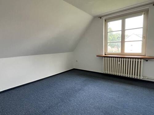 Schlafzimmer im Dachgeschoss - 