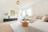 Wohnzimmer - Erstbezug nach Modernisierung! Helle Drei-Zimmer-WHG mit Balkon