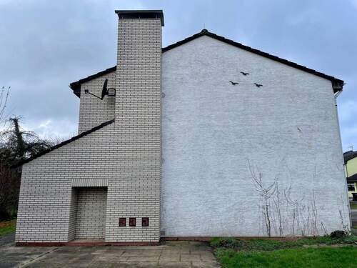 Seitenansicht - 5 Zimmer Einfamilienhaus zum Kaufen in Niddatal / Assenheim