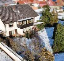 Großzügiges Baugrundstück mit Garage und Altbestand - Wertheim / Mondfeld