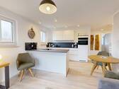 Blick in den Küchenbereich mit Küchenblock - 2 Zimmer Etagenwohnung zum Kaufen in Ostseeheilbad Zingst