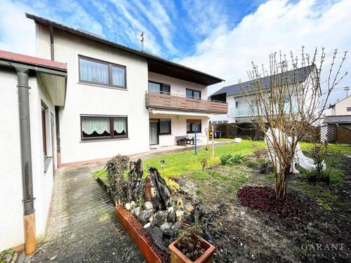 Blick-auf-Terrasse - 1 Zimmer Mehrfamilienhaus, Wohnhaus zum Kaufen in Aspach