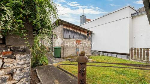 Garten 1 - Einfamilienhaus mit 140,00 m² in Hungen zum Kaufen