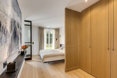 Masterbedroom mit hochwertigen Einbauten - 