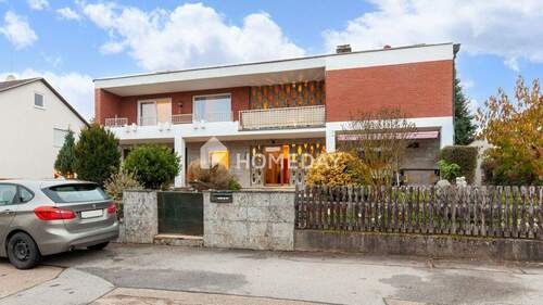 Außenansicht 1 - Charmantes Einfamilienhaus in ruhiger Lage mit Kamin, Loggia und gepflegtem Garten