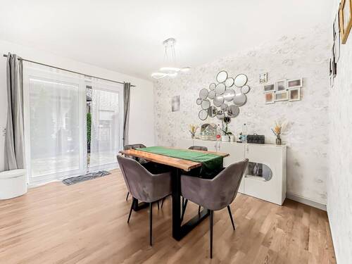 Wohnzimmer - Doppelhaushälfte mit 109,00 m² in Rheda-Wiedenbrück zum Kaufen