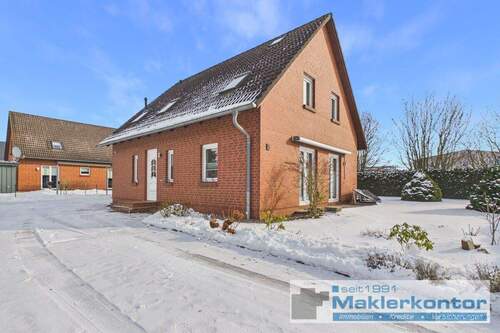 Objektfassade - Lichtdurchflutetes Einfamilienhaus mit Garage in super Lage