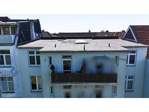Dachgeschosswohnung mit Balkon - 