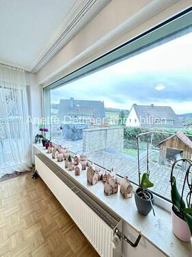 7 EG Wohnzimmer Blick Terasserasse:Garten - 