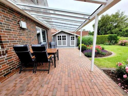 Terrasse mit Glaselementen überdacht - 