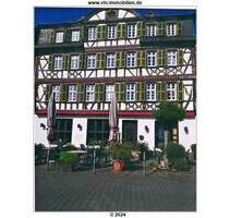 Ein schönes Wohn- und Geschäftshaus mit Fachwerkelementen in Kaub