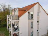 Blick vom Balkon auf das baugleiche Nachbarhaus - 
