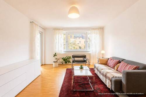 Wohnzimmer - AIGNER - Charmante 3-Zimmer Wohnung in zentraler Lage mit Blick ins Grüne