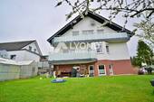 Bild 2 - 8 Zimmer Mehrfamilienhaus, Wohnhaus zum Kaufen in Unzenberg