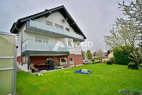 Bild 3 - 8 Zimmer Mehrfamilienhaus, Wohnhaus in Unzenberg