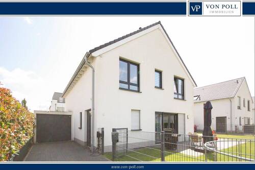 Titelbild - Charmantes Einfamilienhaus mit großem Garten und viel Potenzial
