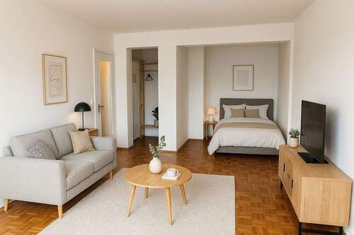 Wohnzimmer mit Bettnische - 1 Zimmer Etagenwohnung zum Kaufen in München