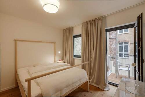 Schlafzimmer mit Balkon - 