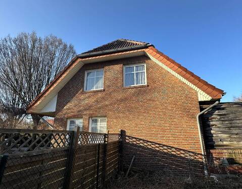 Seitenansicht - Einfamilienhaus mit 110,00 m&sup2; in Twist zum Kaufen