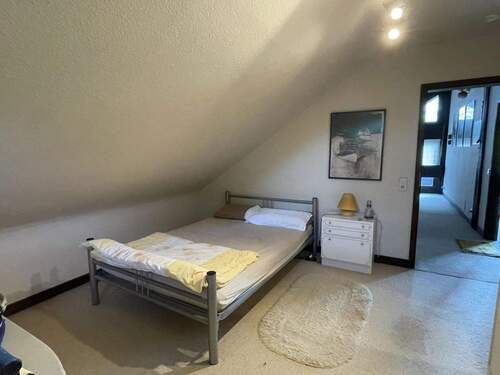 Zimmer im Dachgeschoss - 