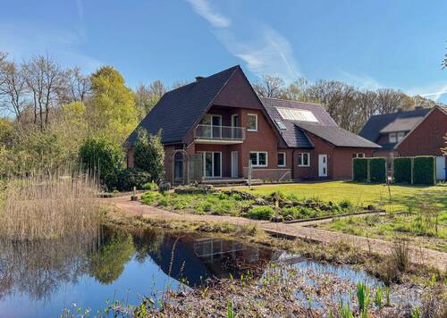 Rück-/Gartenansicht - Starten Sie in Ihr Projekt 'Eigenheim' - großzügiges Wohnhaus in Recke-Espel