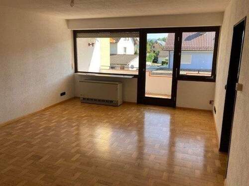 Wohnzimmer mit Ausgang zur... - Etagenwohnung mit 85,00 m&sup2; in Seelbach zum Kaufen