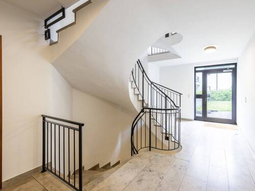 Treppenhaus Bild 2 - Etagenwohnung mit 115,00 m² in München zum Kaufen