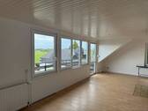 Wohn- und Esszimmer - Etagenwohnung mit 65,00 m&sup2; in Burg (Dithmarschen) zur Miete