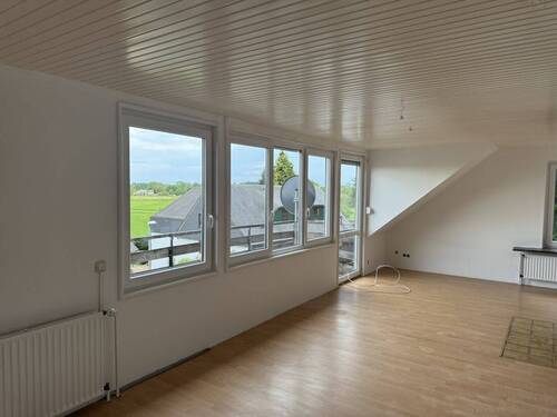 Wohn- und Esszimmer - Etagenwohnung mit 65,00 m&sup2; in Burg (Dithmarschen) zur Miete