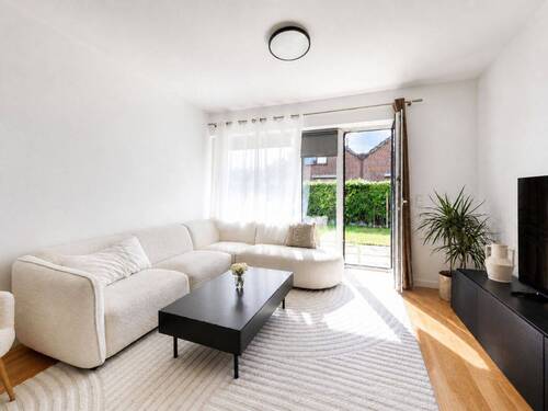 Wohnbereich - Helle Erdgeschosswohnung mit Terrasse und privatem Gartenanteil in bevorzugter Lage von Norderstedt