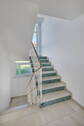 Treppe mit Natursteinbelag - 