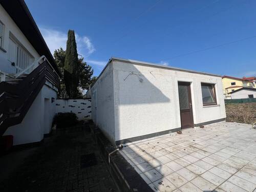 Anbau an die Garage mit Terrasse - 