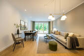 Wohnzimmer_gestaged - 3 Zimmer Terrassenwohnung in Elmshorn