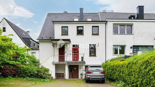 Außenansicht 2 - Zwei-Familienhaus mit Zahnarztpraxis am Universitätsklinikum in Essen Holsterhausen