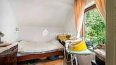 1. OG Schlafzimmer 1 - 