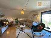 gemütlicher Wohnbereich - Dachgeschosswohnung mit gemütlichem Ambiente inkl. Garten und Terrasse