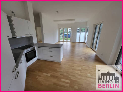 Wohnzimmer mit offener Küche - Etagenwohnung mit 66,70 m&sup2; in Berlin zur Miete