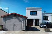 Hausansicht mit Hof und Garage - Doppelhaushälfte mit 129,00 m&sup2; in Themar zum Kaufen