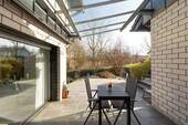 Glasüberdachung mit Sitzplatz - 
