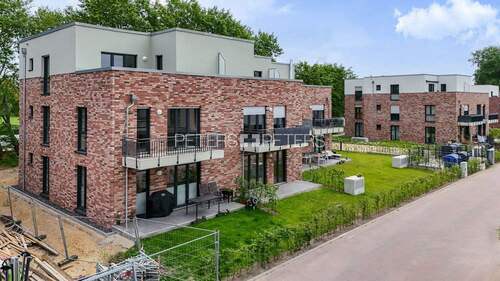 Erdgeschosswohnung mit kleinem Garten - + Viel Potenzial: 2-Zimmer-Wohnung im Neubau in Hasloh +