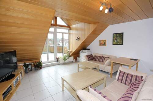 Wohnbereich mit Ausgang auf die Dachterrasse - Etagenwohnung mit 106,90 m&sup2; in Gifhorn zum Kaufen