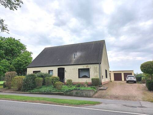 Wohnhaus - Einfamilienhaus mit 152,20 m² in Grasberg / Huxfeld zum Kaufen