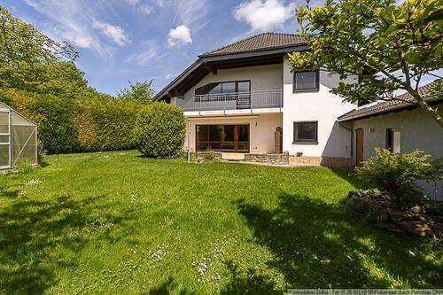 Blick aus dem Garten - Einfamilienhaus mit 166,00 m&sup2; in Welcherath zum Kaufen