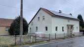 Straßenseite - Einfamilienhaus mit 130,00 m² in Pulsnitz zum Kaufen