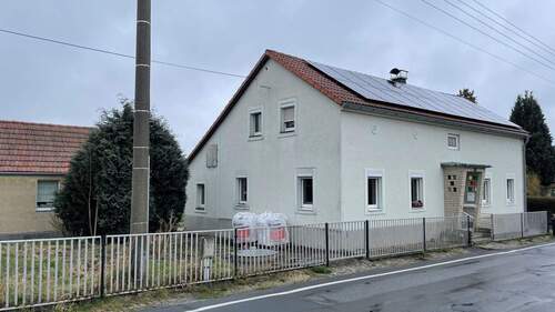 Straßenseite - Einfamilienhaus mit 130,00 m² in Pulsnitz zum Kaufen