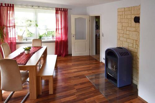 EG Wozi Essecke mit Kamin.jpg - 4 Zimmer Einfamilienhaus in Trittau
